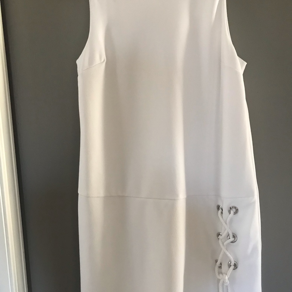 CeCe white lined sleeveless, drop-waist dress.